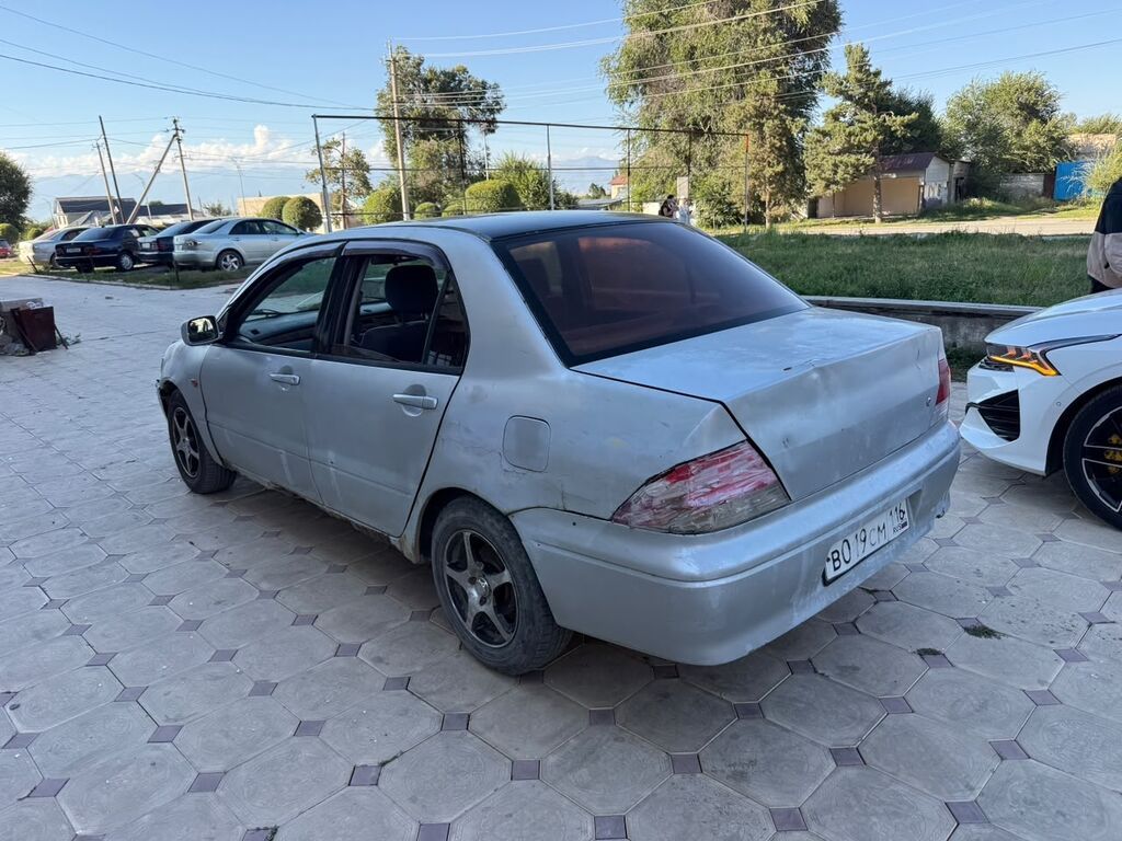 Mitsubishi Lancer: 2001 г., 1.6 л, Автомат, Бензин, Седан: фото 5