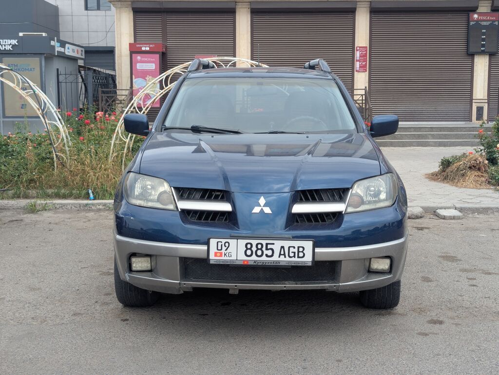 Mitsubishi Outlander: 2004 г., 2 л, Механика, Бензин, Кроссовер: фото 3