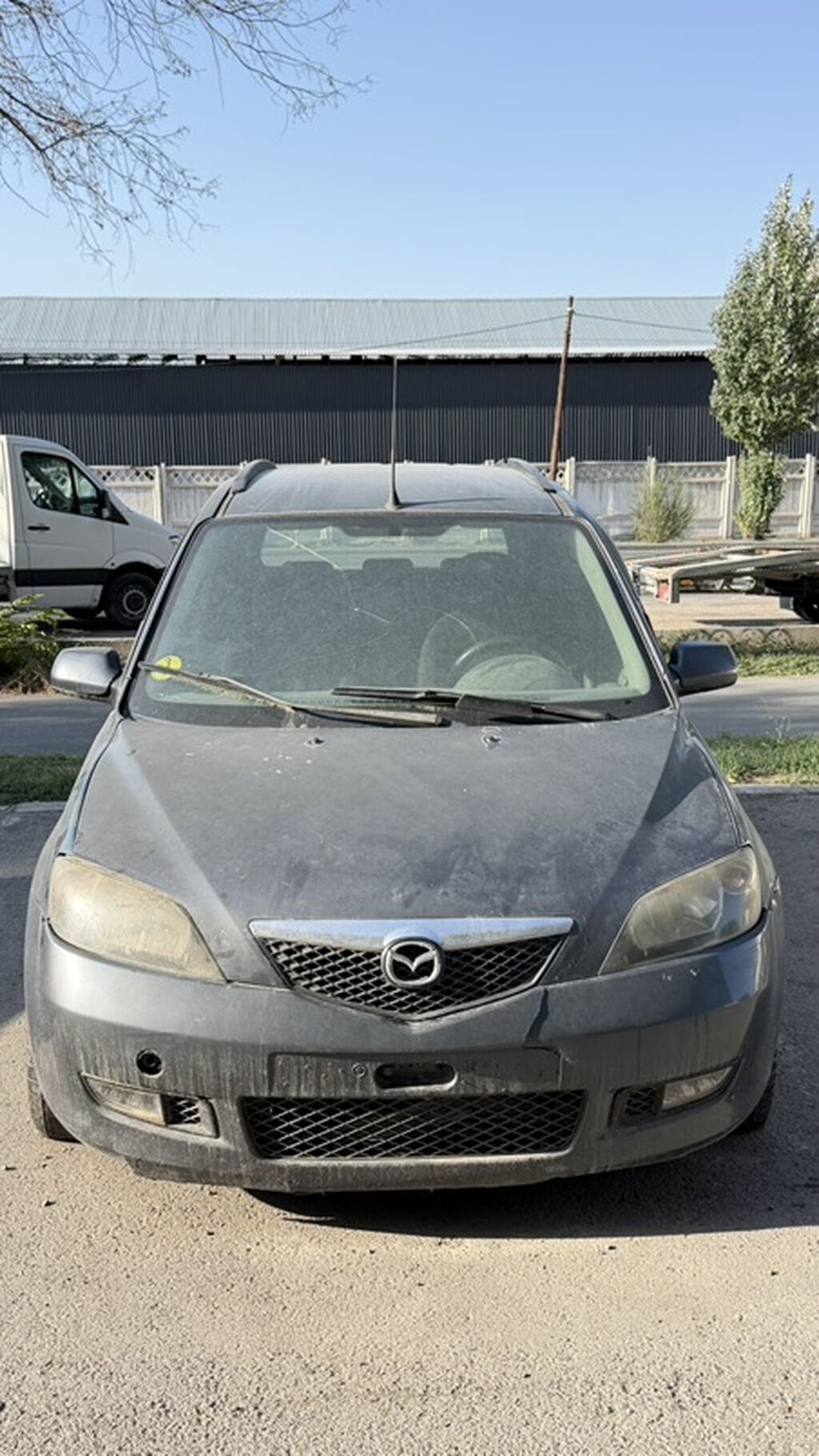 Mazda Demio: 2004 г., Хэтчбэк: фото 4