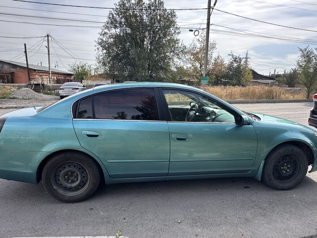 Nissan Altima: 2001 г., 2.5 л, Автомат, Газ, Седан: фото 3