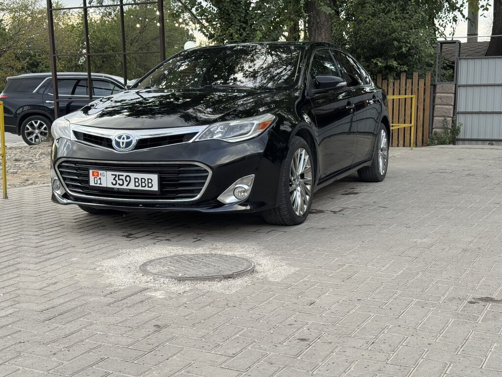 Kia K7: 2013 г., 2.5 л, Вариатор, Гибрид, Седан: фото 3