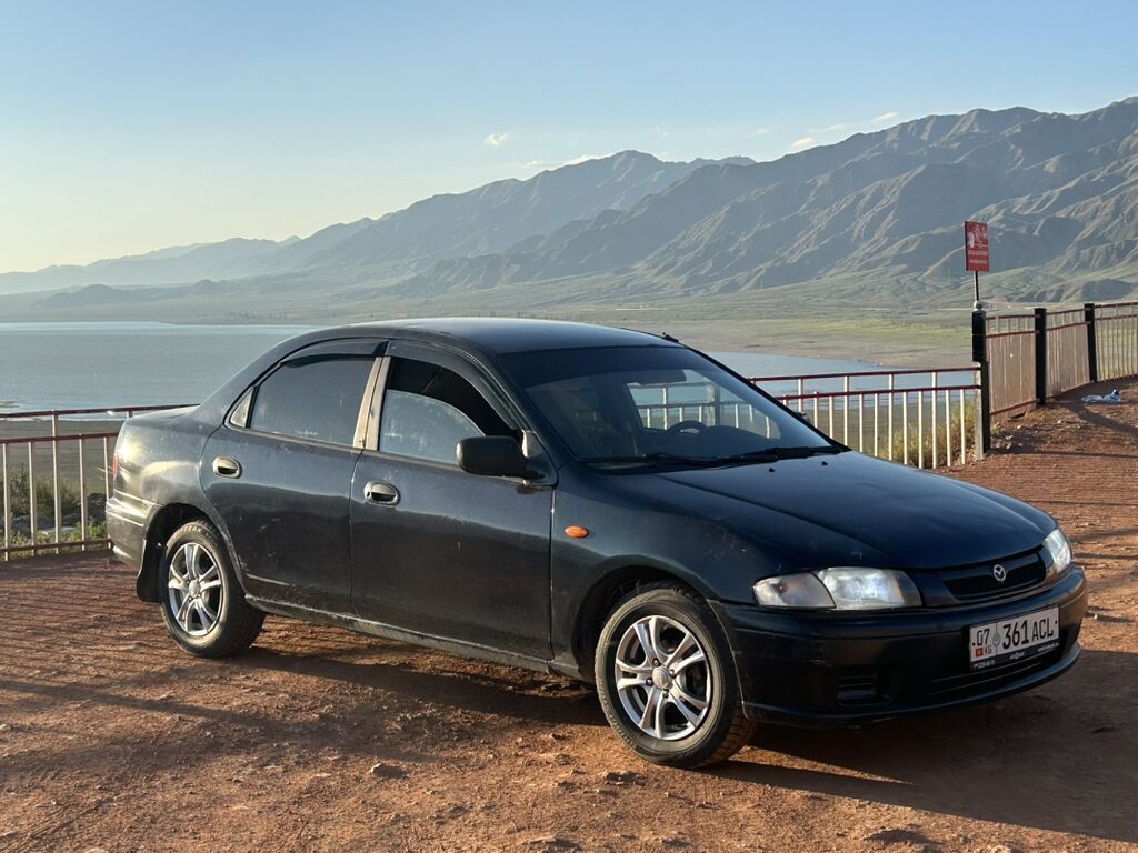 Mazda 323: 1999 г., 1.5 л, Автомат, Бензин, Седан: фото 4