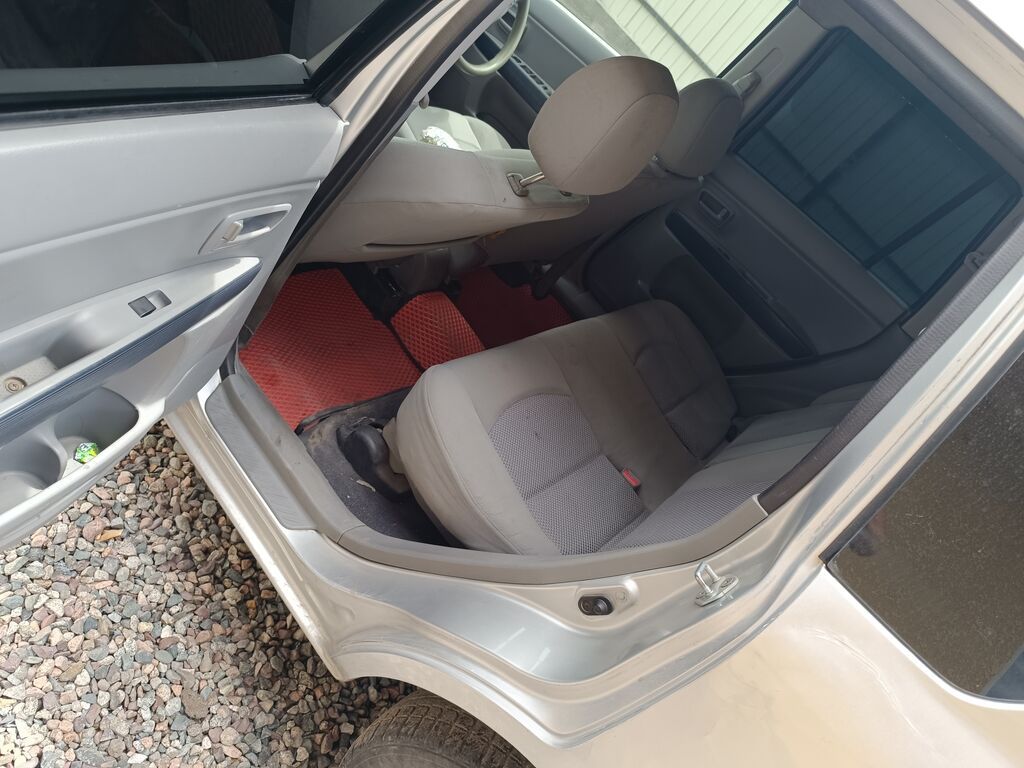 Mazda Demio: 2002 г., 1.3 л, Автомат, Бензин, Универсал: фото 7