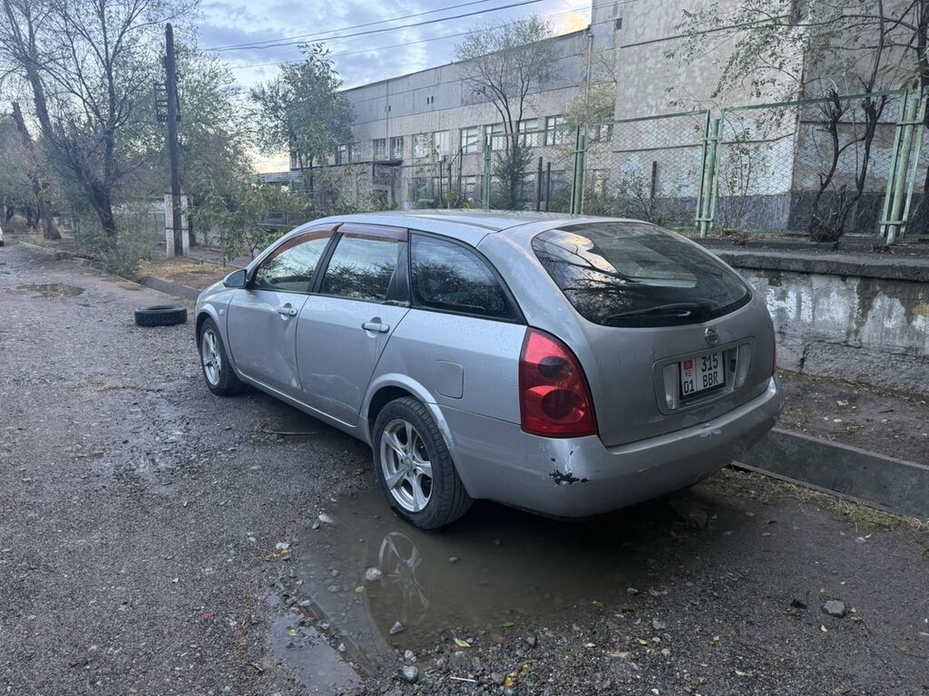 Nissan Primera: 2001 г., 2 л, Бензин, Универсал: фото 1