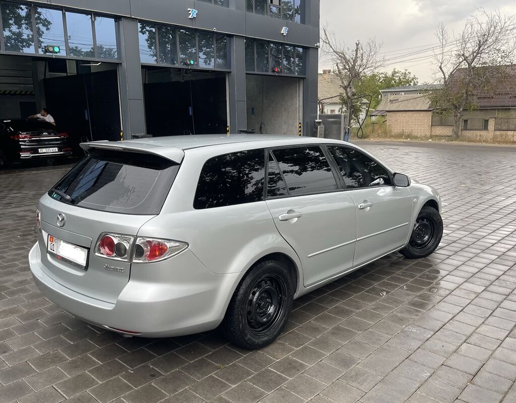 Mazda 6: 2002 г., 2 л, Автомат, Бензин, Универсал: фото 4