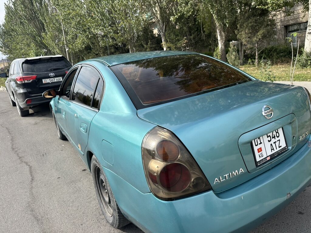 Nissan Altima: 2001 г., 2.5 л, Автомат, Газ, Седан: фото 6