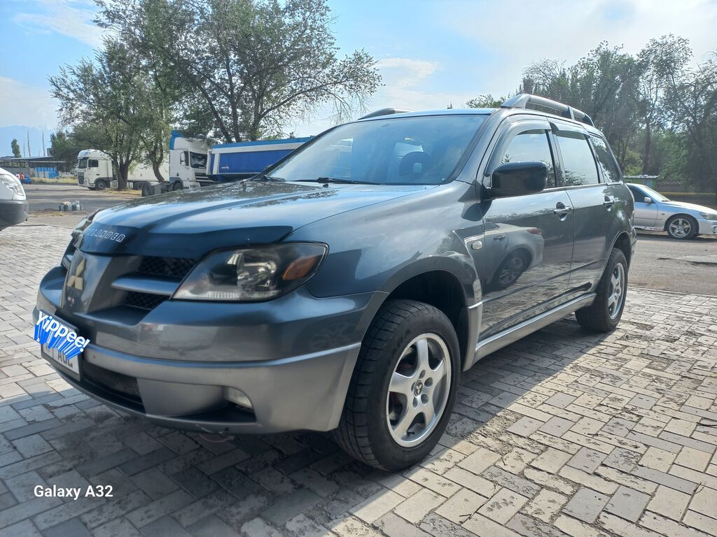 Mitsubishi Outlander: 2003 г., 2 л, Механика, Бензин, Кроссовер — фото 5