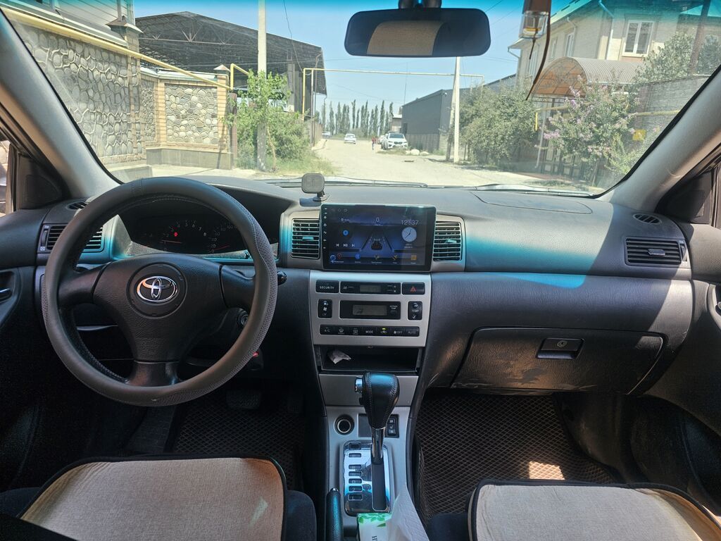 Toyota Corolla: 2004 г., 1.6 л, Автомат, Бензин, Хэтчбэк: фото 6