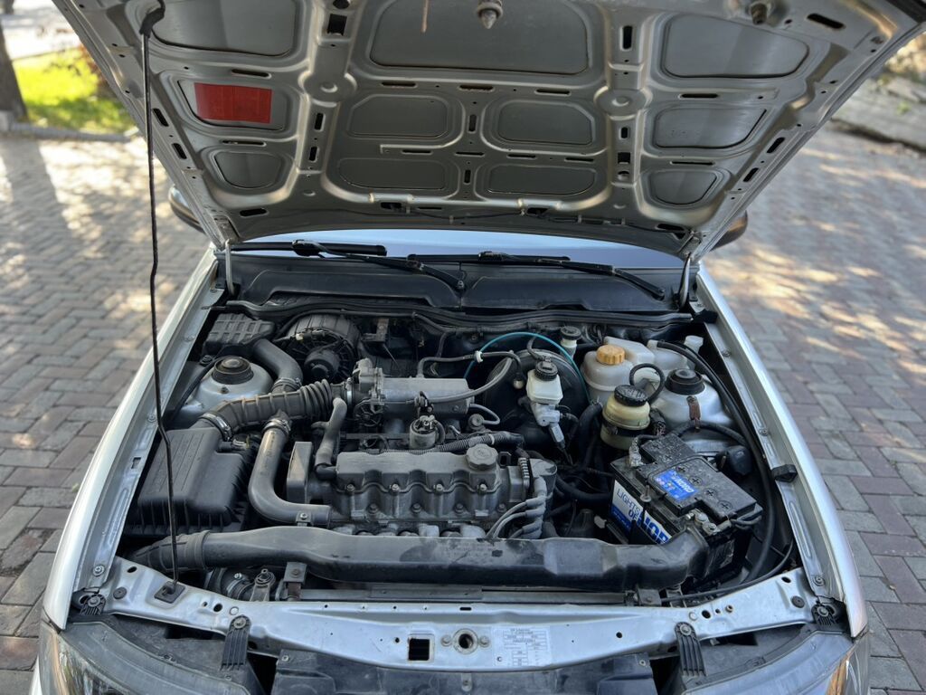 Daewoo Nexia: 2011 г., 1.5 л, Механика, Бензин, Седан: фото 6