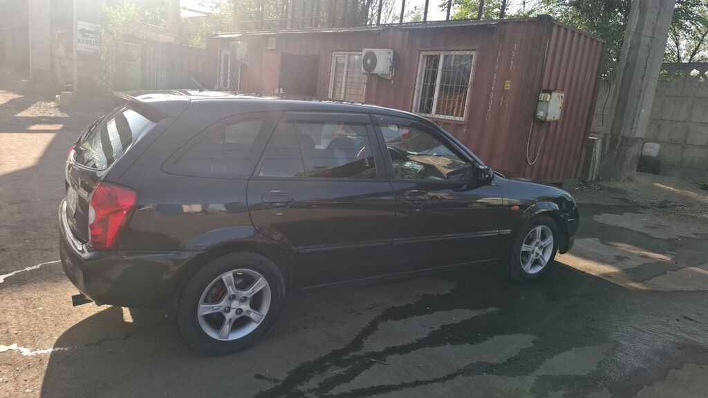Mazda 323: 2002 г., 1.6 л, Механика, Бензин, Универсал: фото 7