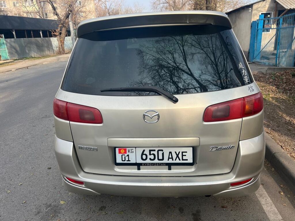 Mazda Demio: 2003 г., 1.3 л, Автомат, Бензин, Хэтчбэк: фото 4
