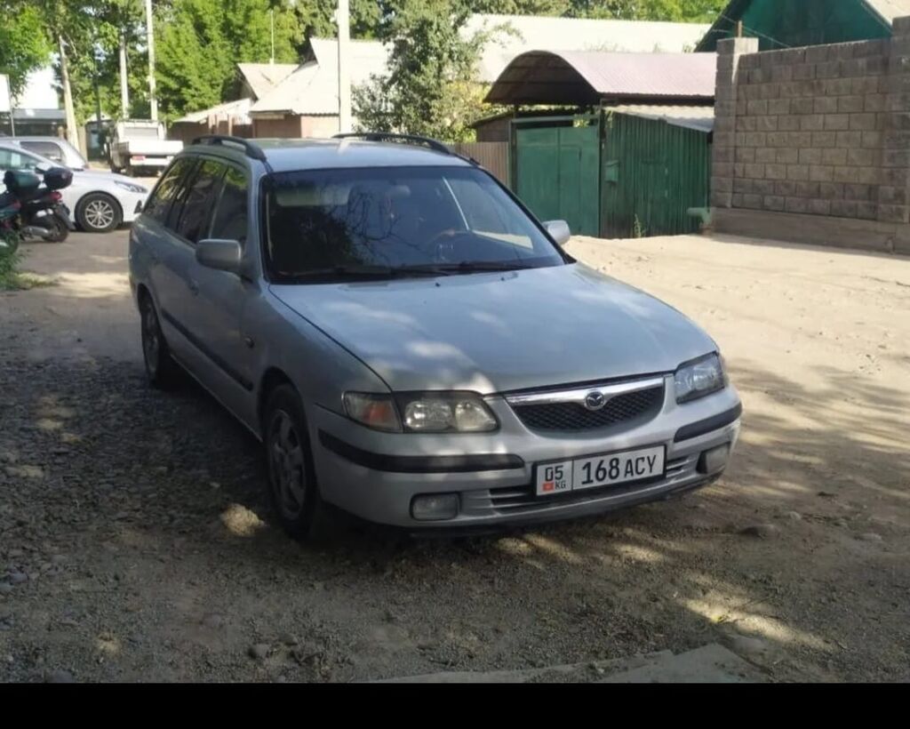 Mazda 626: 1999 г., 2 л, Механика, Газ, Универсал: фото 3