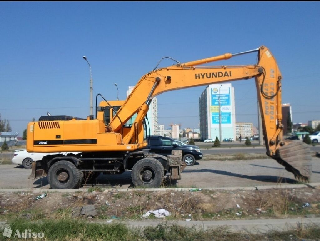 Экскаватор кыргызстан. Экскаватор Hyundai 16 метровой. Строительная техника Daewoo. Экскаватор колесный Тошкент. Китайские экскаваторы Hyndai с объёмом ковша 3.5.