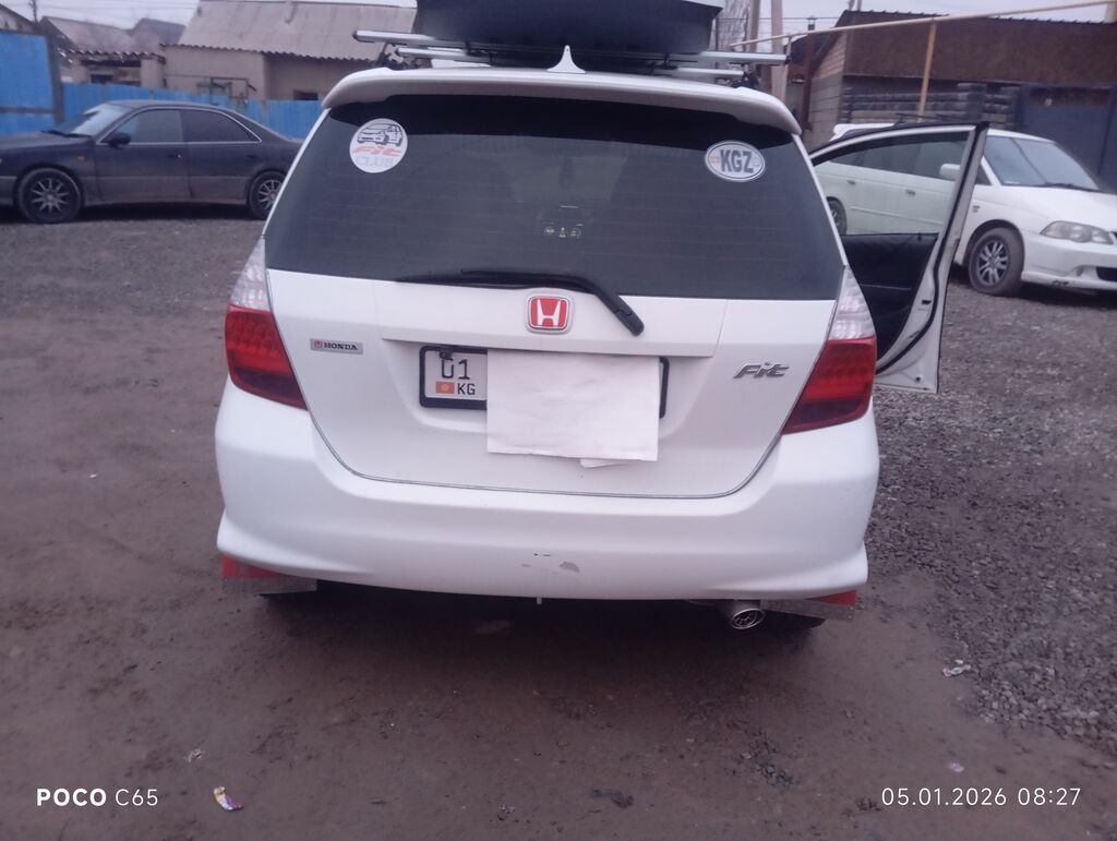 Honda Fit: 2002 г., 1.3 л, Вариатор, Бензин, Хэтчбэк: фото 2