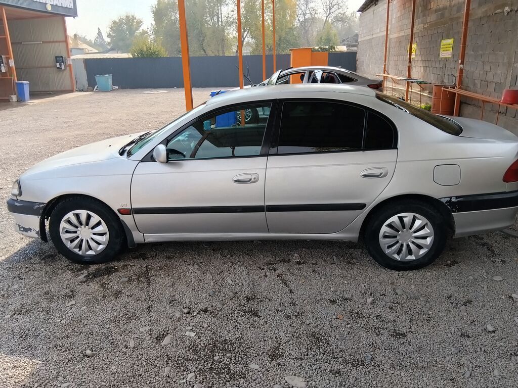 Toyota Carina E: 1999 г., 1.8 л, Механика, Бензин, Седан: фото 5