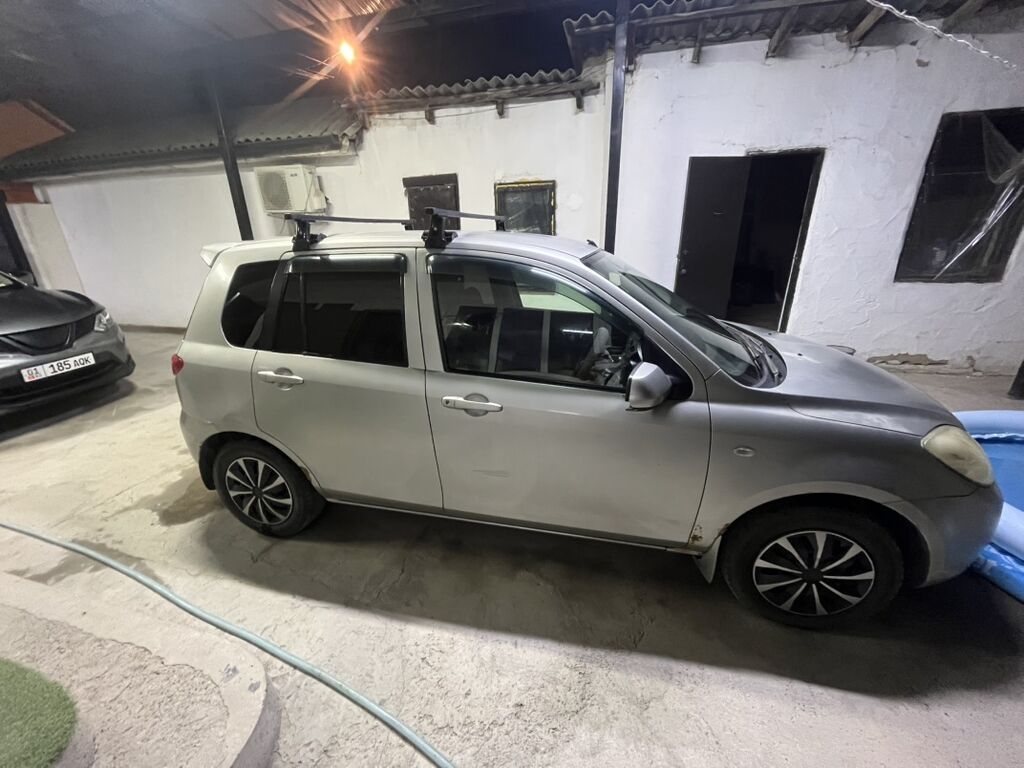 Mazda Demio: 2005 г., 1.3 л, Автомат, Бензин, Хэтчбэк: фото 5
