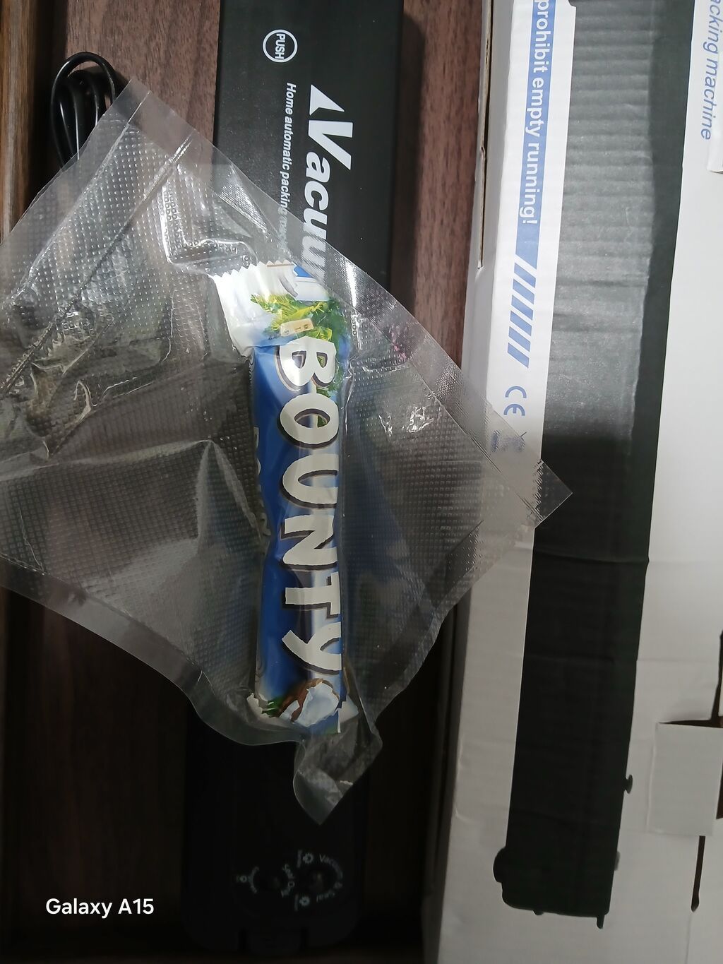 Вакууматор Vacuum Sealer Q — компактная автоматическая машина для: фото 3
