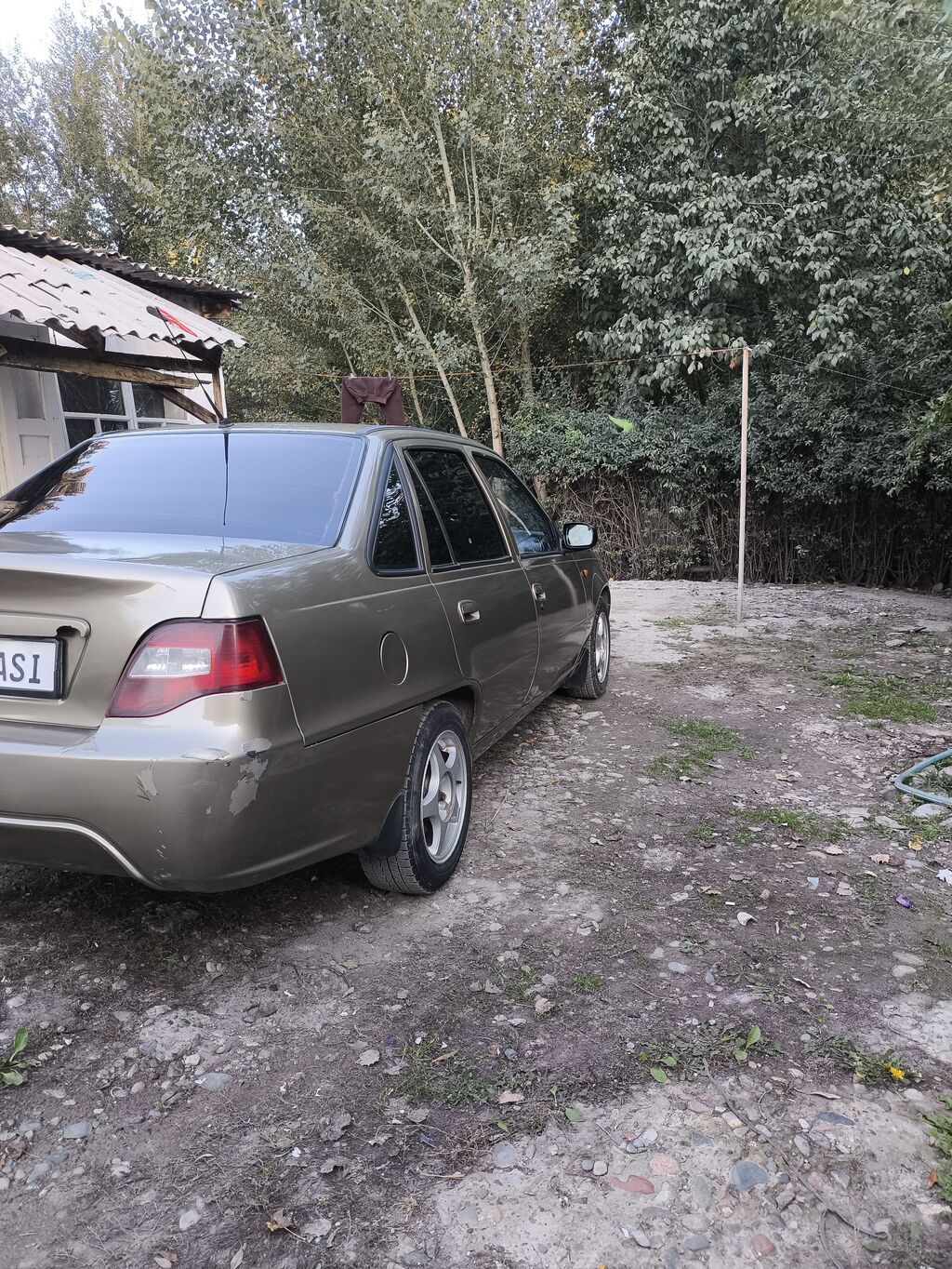 Daewoo Nexia: 2011 г., 1.6 л, Механика, Седан: фото 6