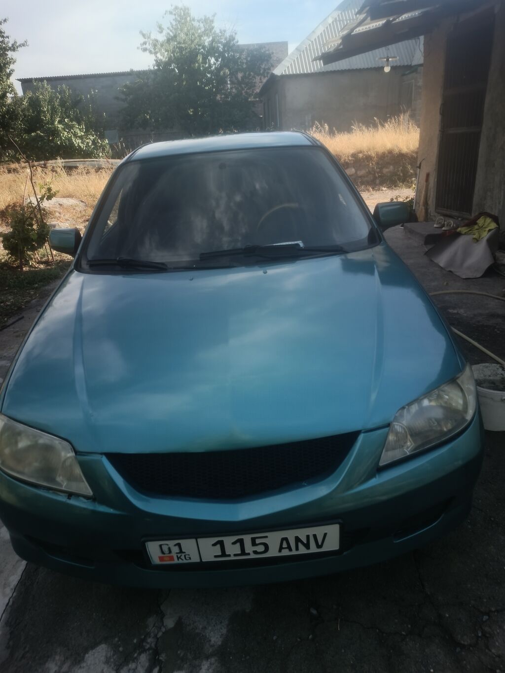 Mazda Familia: 2003 г., 1.6 л, Механика, Газ, Универсал: фото 2
