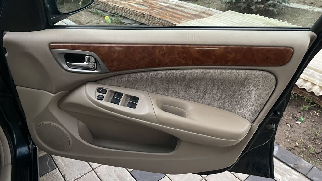 Nissan Bluebird: 2003 г., 1.8 л, Автомат, Бензин, Седан: фото 4