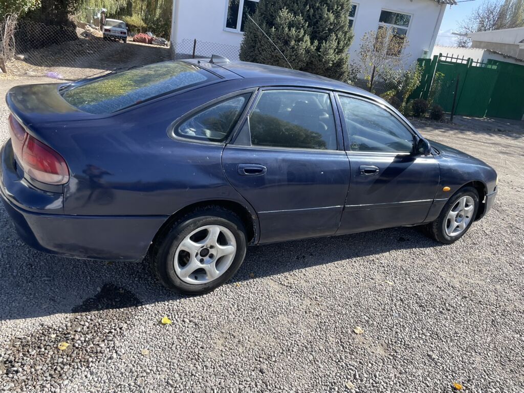 Mazda Cronos: 1994 г., Седан: фото 5