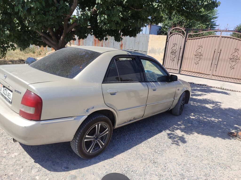 Mazda Protege: 2002 г., 1.5 л, Автомат, Бензин, Седан: фото 2