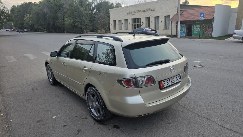 Mazda 6: 2003 г., 2 л, Автомат, Бензин, Универсал: фото 5