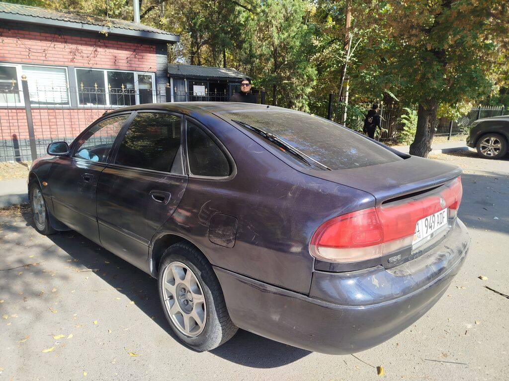 Mazda 626: 1994 г., 1.8 л, Механика, Бензин, Седан: фото 8