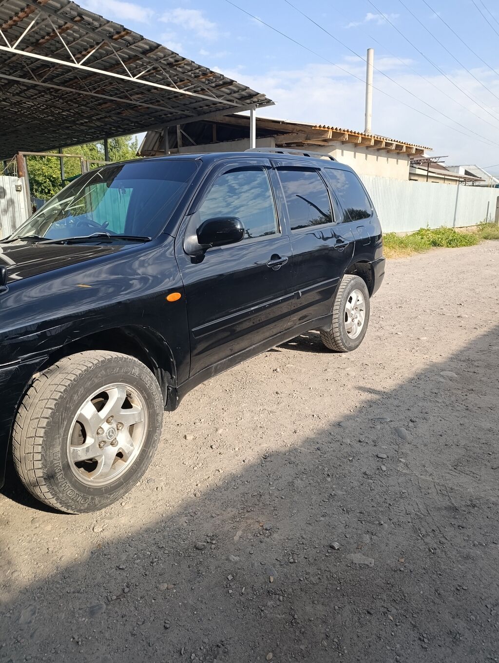 Mazda Tribute: 2002 г., 2 л, Автомат, Бензин, Кроссовер: фото 3
