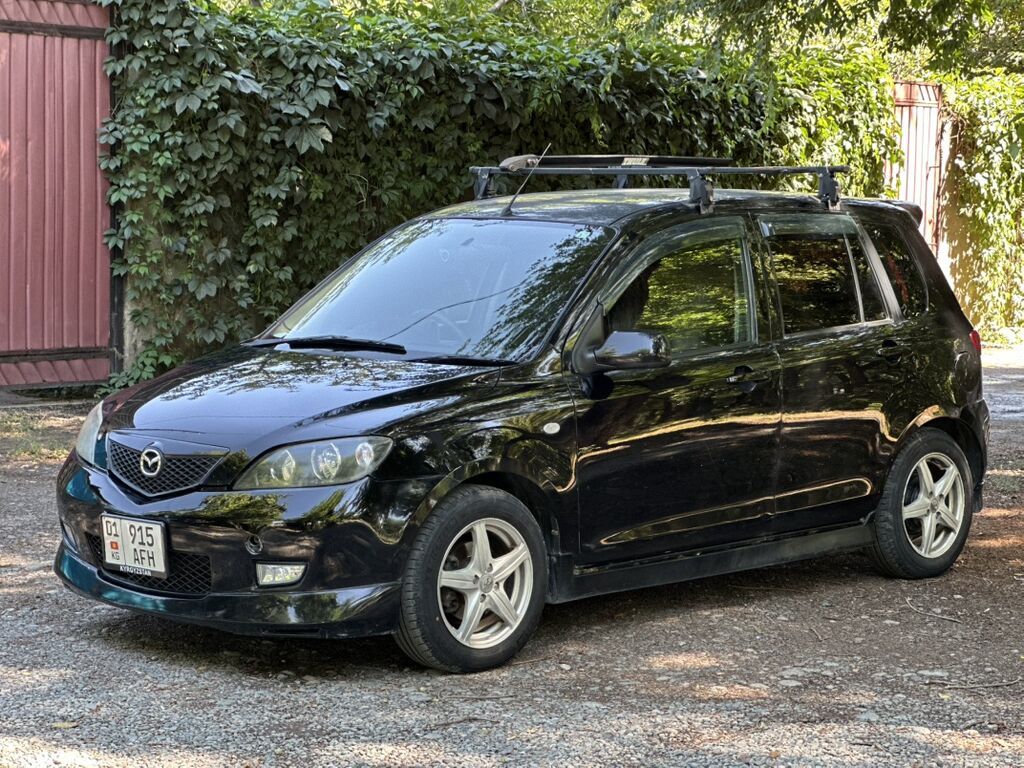 Mazda Demio: 2004 г., 1.5 л, Автомат, Бензин, Хэтчбэк — фото 4