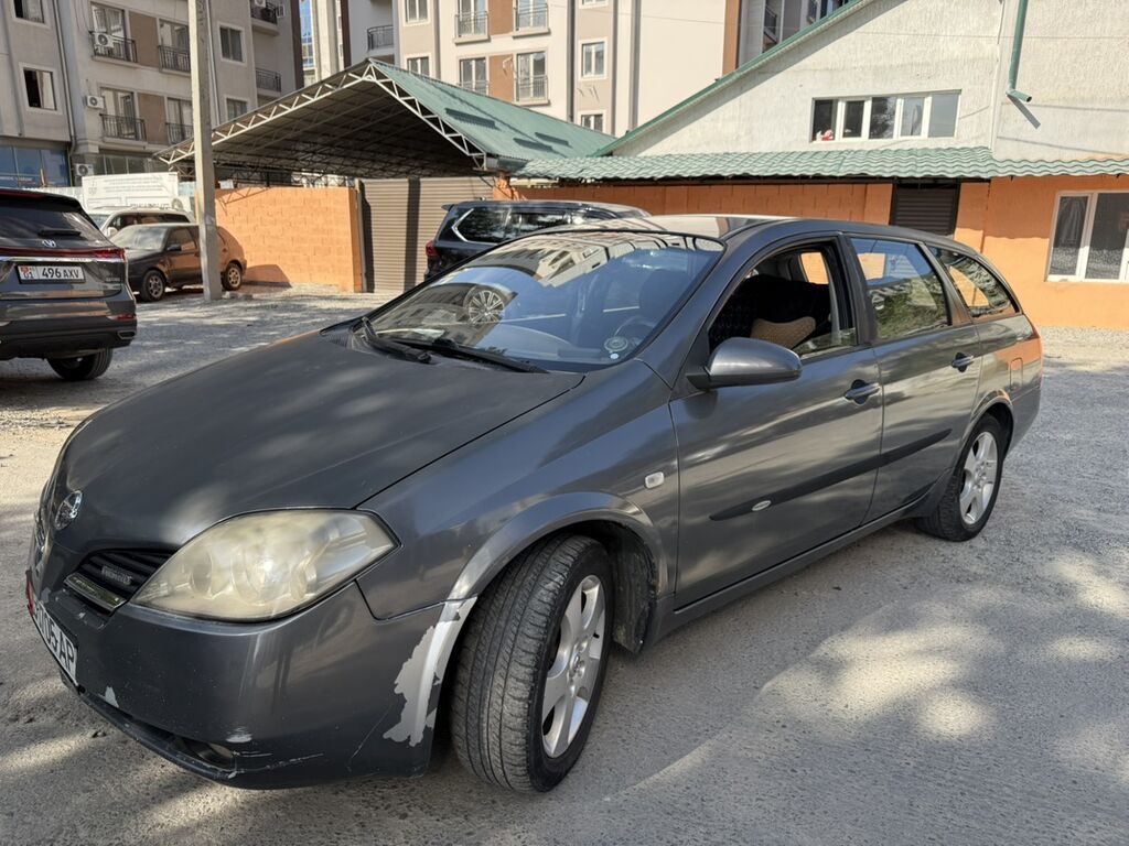 Nissan Primera: 2004 г., 2 л, Механика, Бензин, Универсал: фото 8