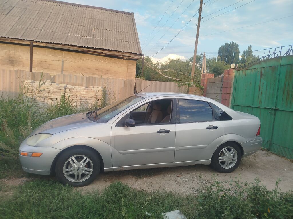 Ford Focus I (седан/хэтчбек) — интерьер и оснащение - Автоматическая: фото 7