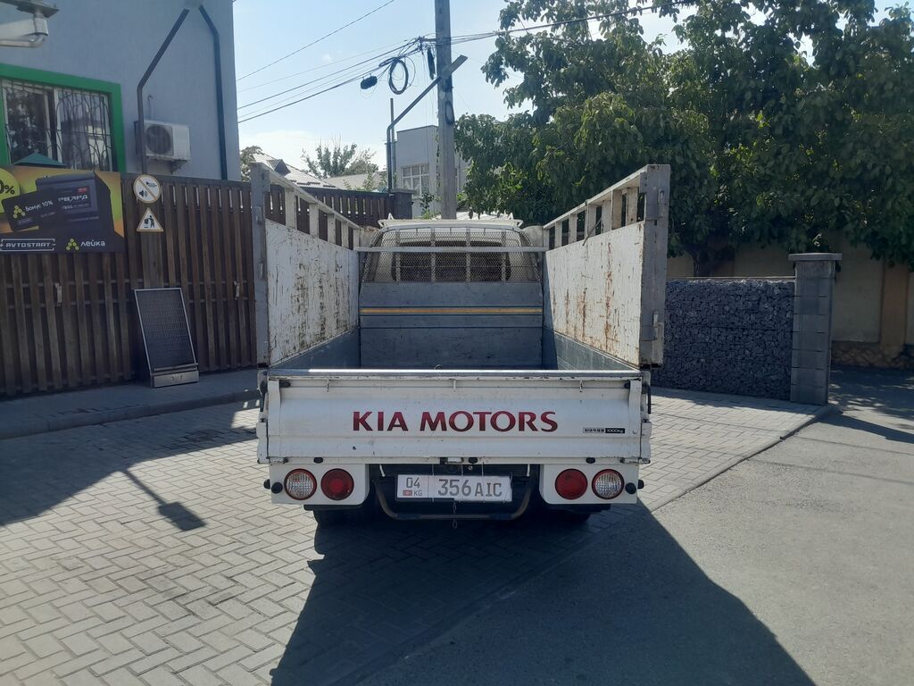 KIA Bongo III — легкий грузовик с открытым бортом. Основные: фото 7