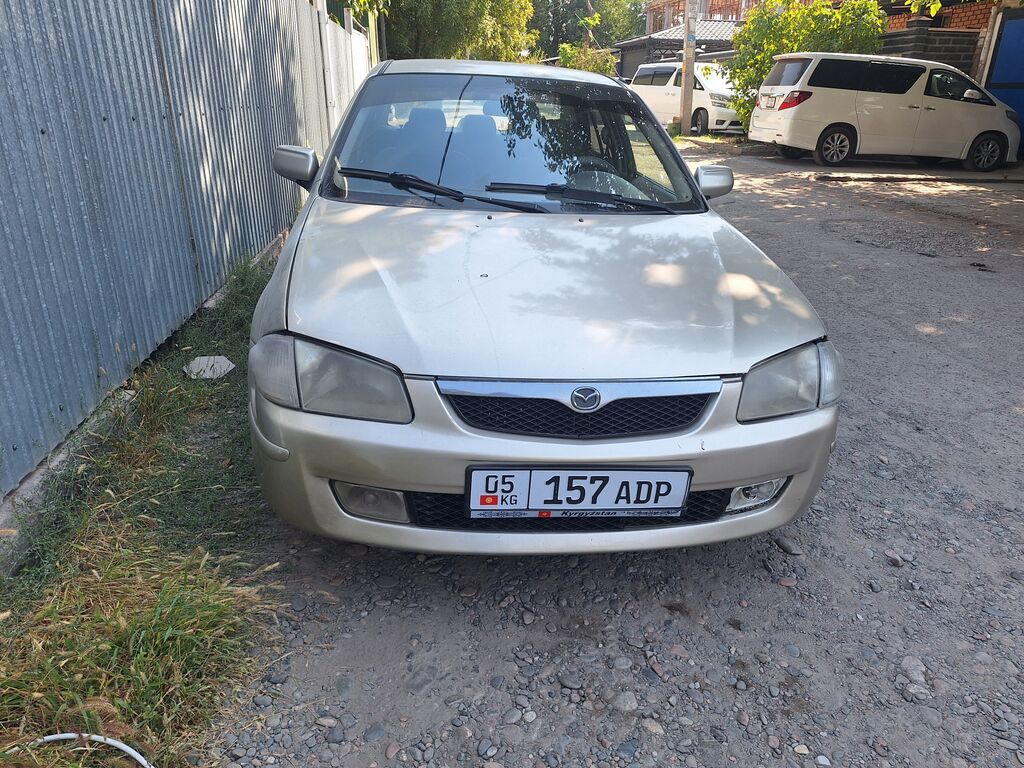 Mazda 323: 2000 г., 1.5 л, Автомат, Бензин, Седан: фото 6