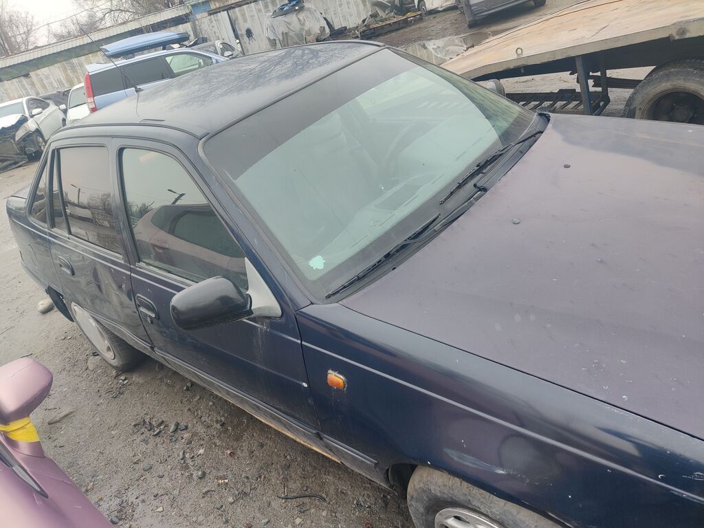 Daewoo Nexia: 2004 г., Механика, Бензин, Седан: фото 1
