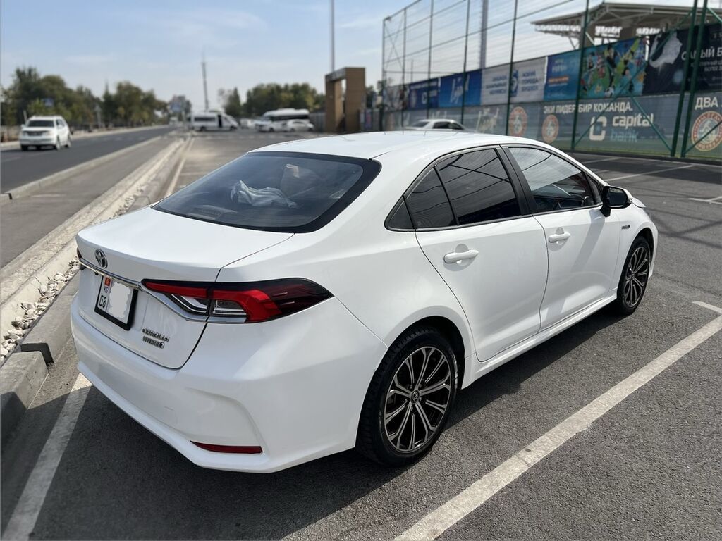 Toyota Corolla: 2020 г., 1.8 л, Вариатор, Гибрид, Седан: фото 5