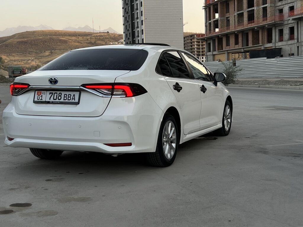 Toyota Corolla: 2021 г., 1.8 л, Вариатор, Гибрид, Седан: фото 5