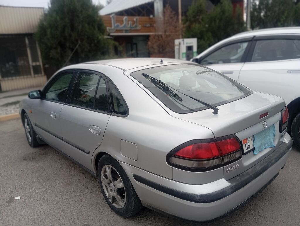 Срочно продам Mazda 626, 1998 г., 2 л, механика: фото 5