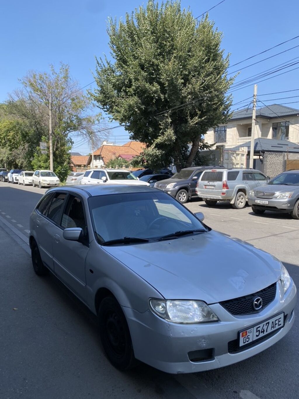 Mazda 323: 2002 г., Механика, Хэтчбэк: фото 3