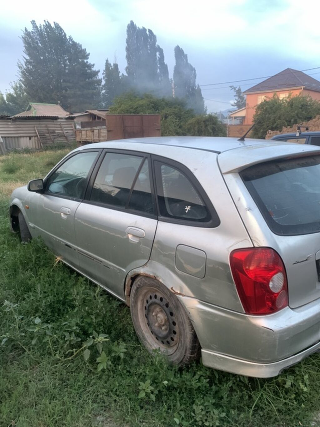 Mazda 323: 2003 г., 2 л, Механика, Бензин, Универсал — фото 2