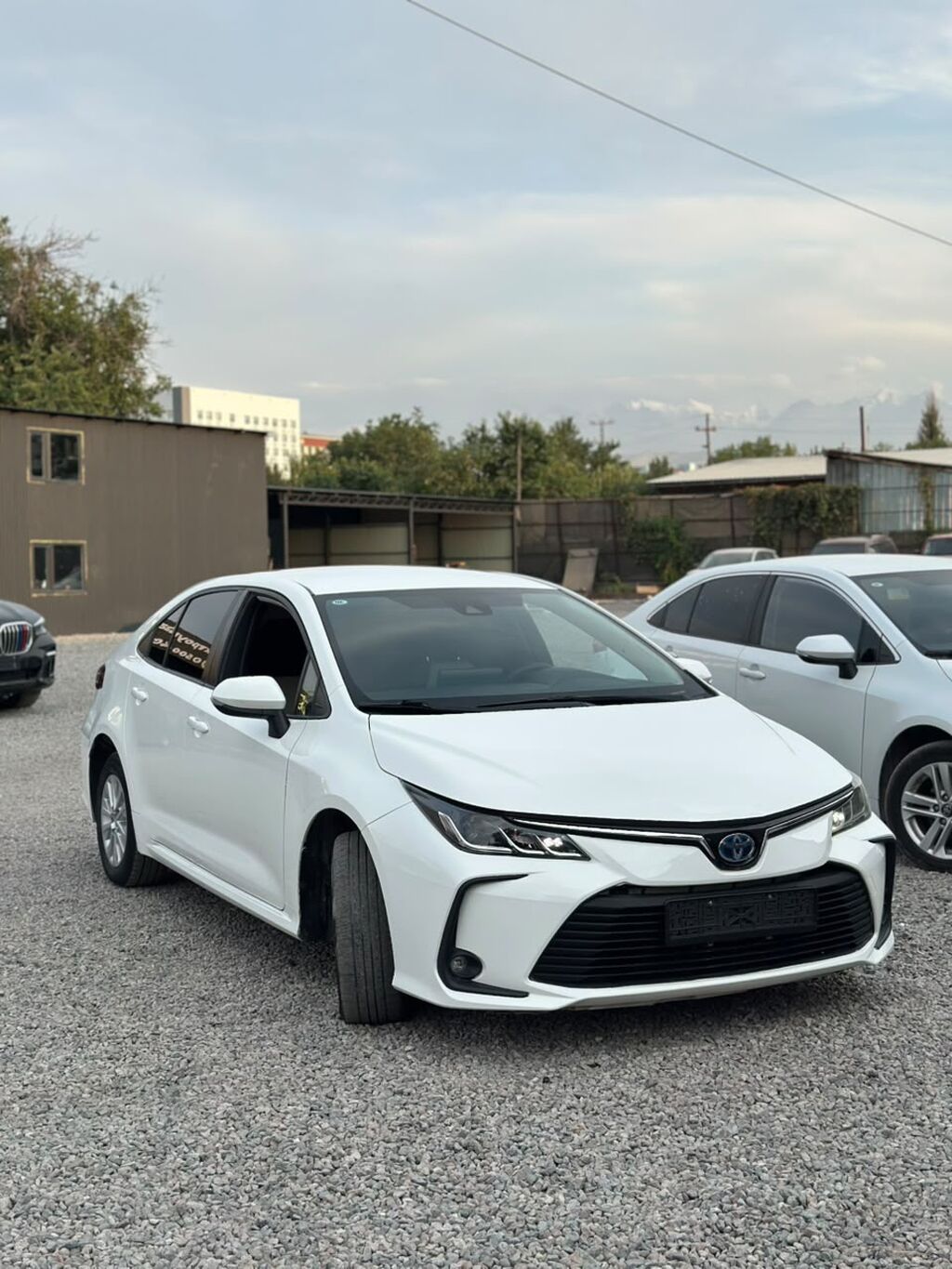 Toyota Corolla: 2022 г., 1.8 л, Вариатор, Гибрид, Седан: фото 1