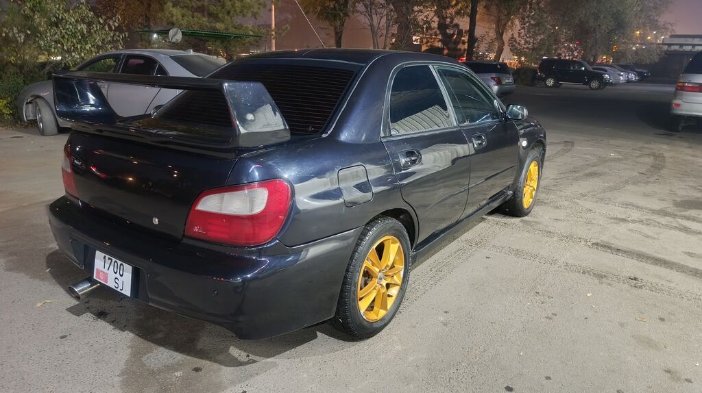 Subaru Impreza: 2001 г., 2 л, Автомат, Бензин, Седан: фото 3