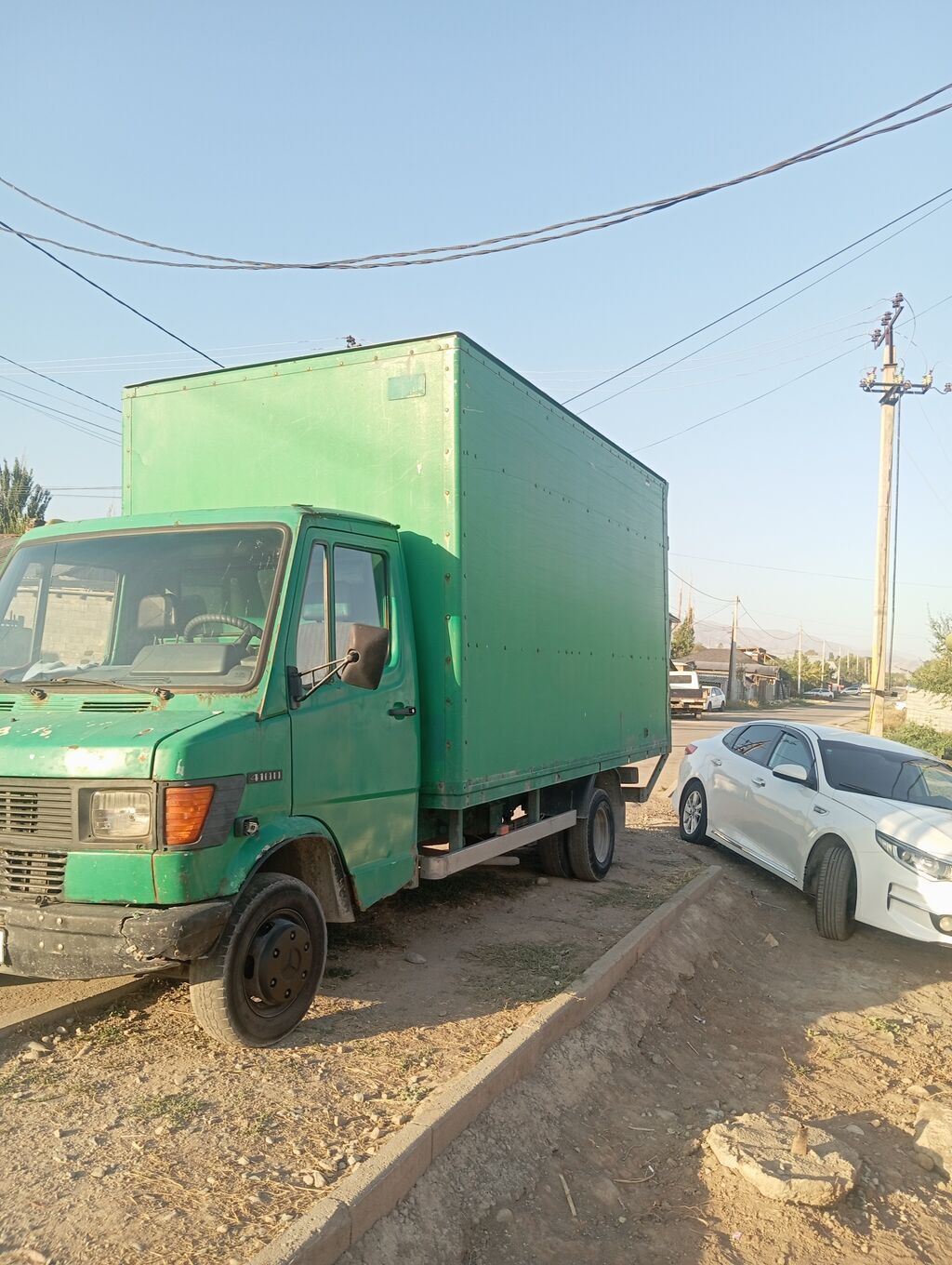 Грузовой фургон на базе малотоннажного автомобиля с будкой. - Тип