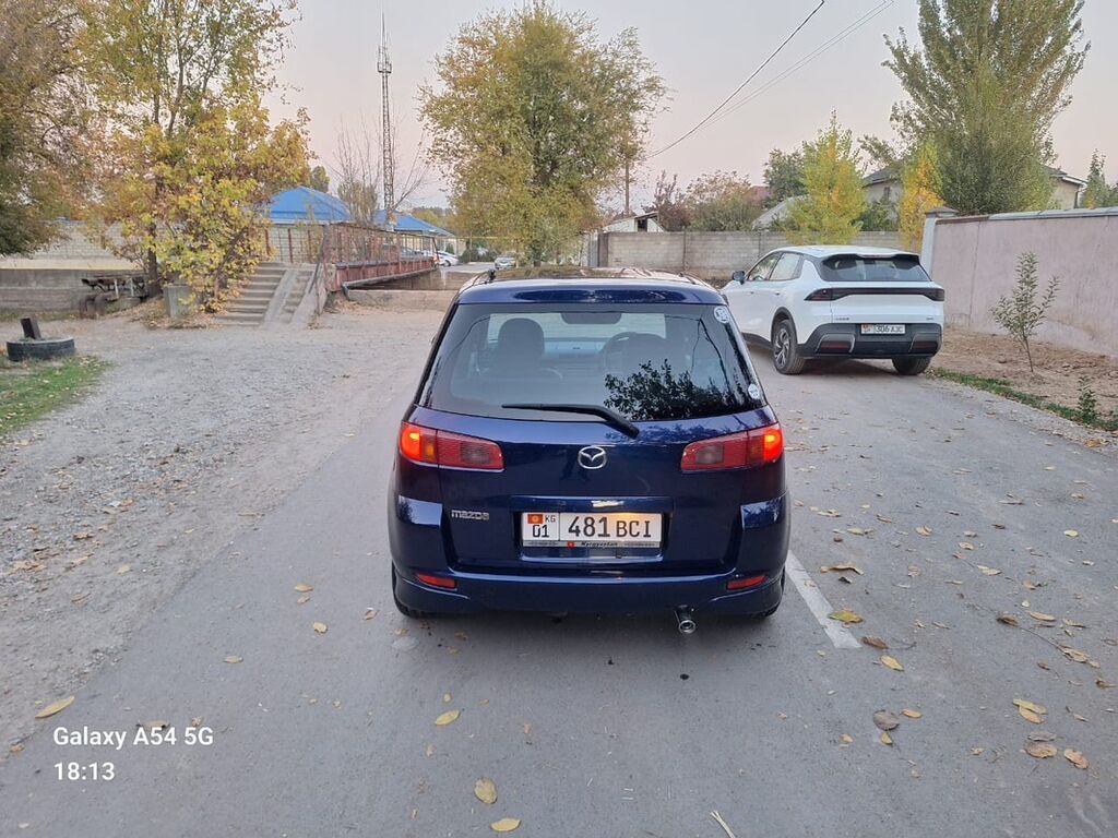 Mazda Demio: 2003 г., 1.3 л, Автомат, Бензин, Хэтчбэк: фото 6