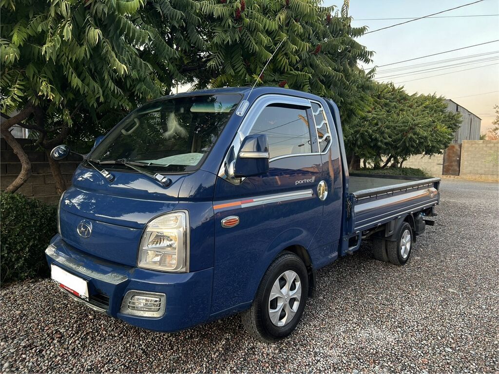 Hyundai Porter II — компактный грузовик с открытой бортовой: фото 1