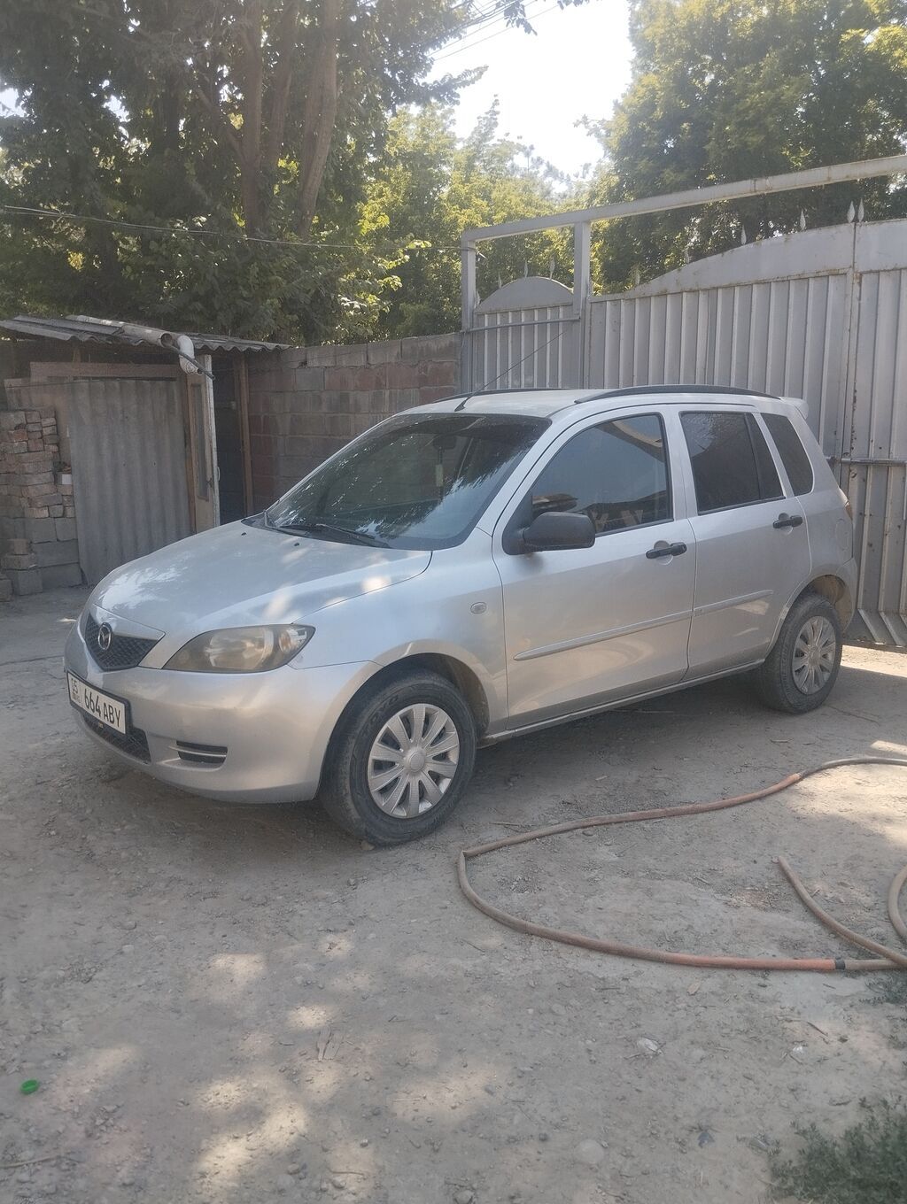 Mazda Demio: 2004 г., 1.3 л, Автомат, Бензин, Хэтчбэк: фото 2