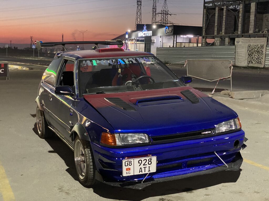 Mazda 323 1991 г., тюнинг, хэтчбек: фото 3