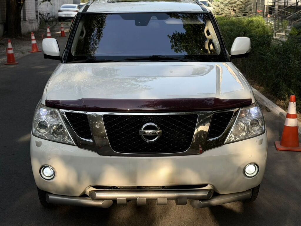 Nissan Patrol: 2014 г., 3 л, Автомат, Бензин, Внедорожник — фото 6