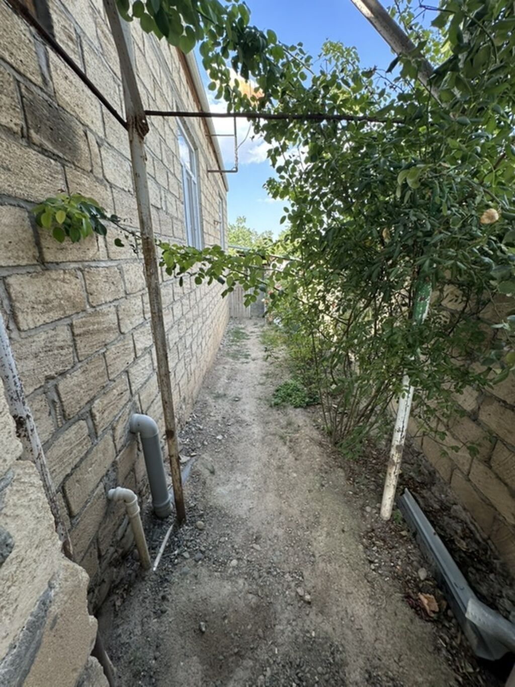 Satılır: 3 otaqlı həyət evi (fotoşəkillərdə) - Geniş dəhliz, taxta