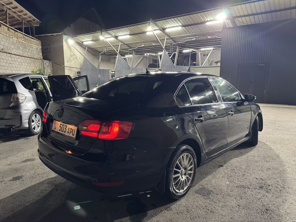 Volkswagen Jetta: 2012 г., 1.6 л, Бензин, Седан — фото 2